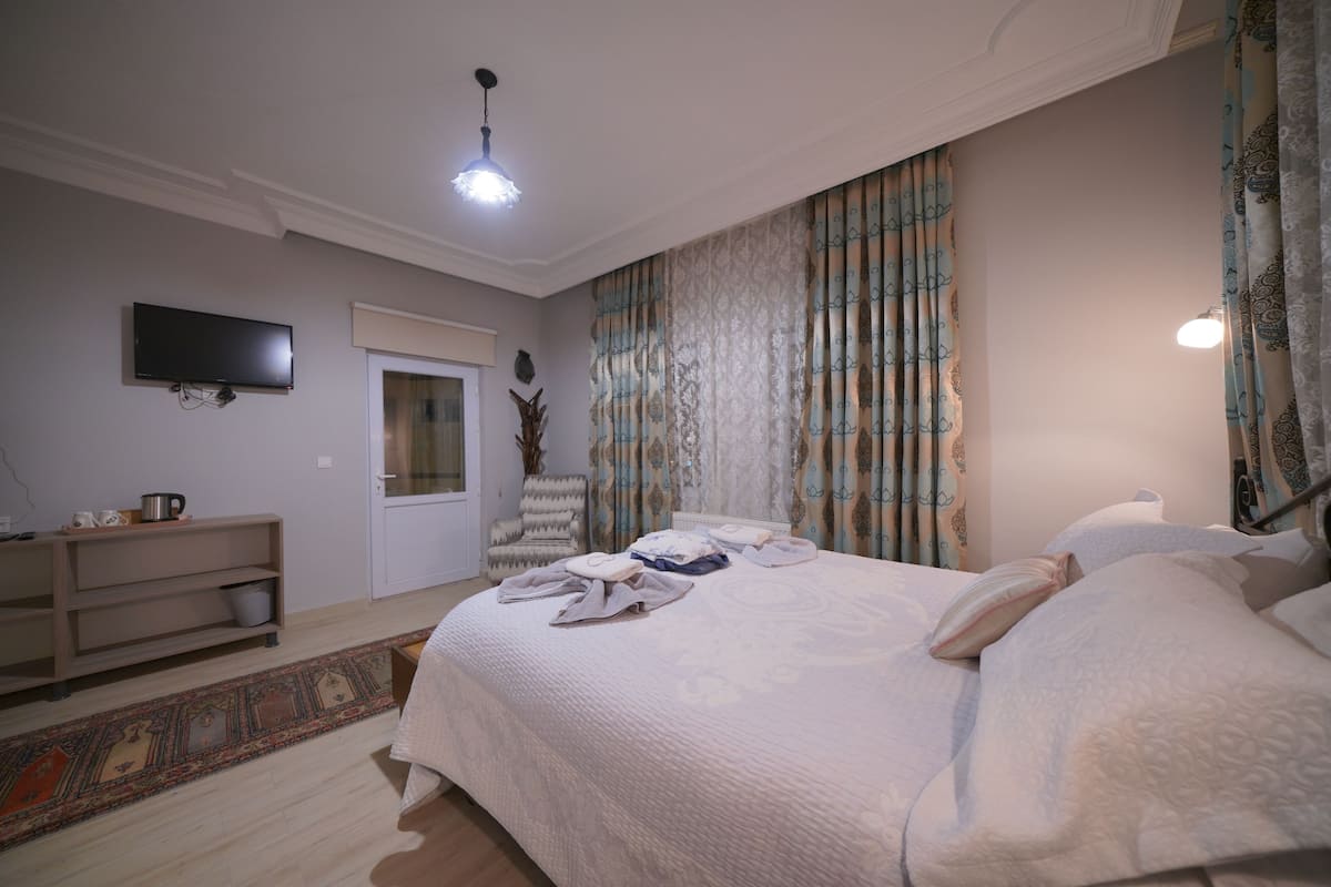Premium bedding, minibar, desk, laptop workspace