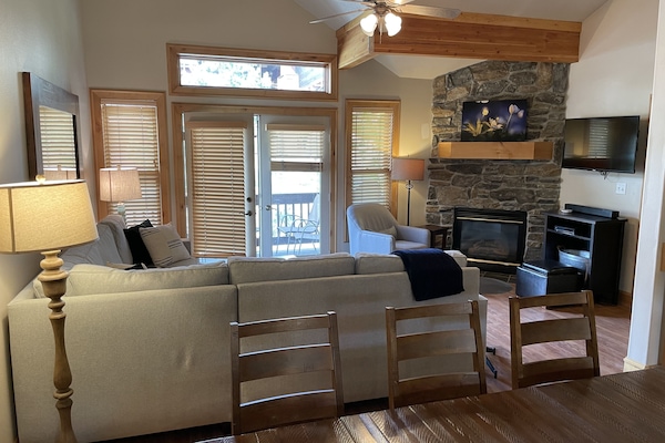 From the kitchen, looking into the seating area.