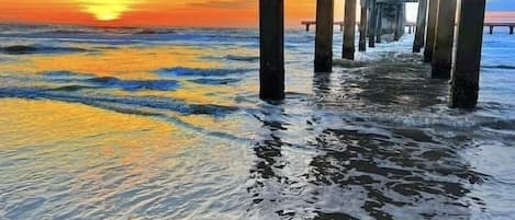 On the beach, sun loungers, beach towels