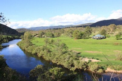 World Famous Rotating house, Riverfront on 40acre, pet friendly, sleeps up to 14