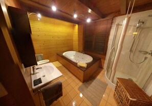 Combined shower/tub, jetted tub, hair dryer, bidet