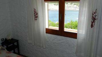 2 slaapkamers, een strijkplank/strijkijzer, beddengoed