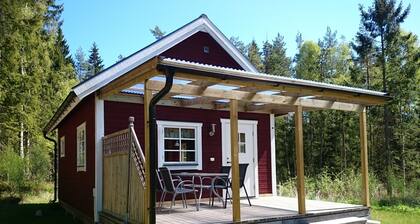 Cozy cottage near the lake, including free Wi-Fi and own rowing boat