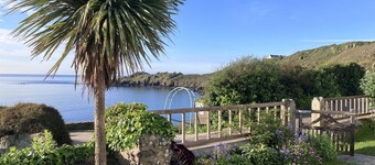 Superb sea views, private off-road parking, fenced garden; spacious, light, airy