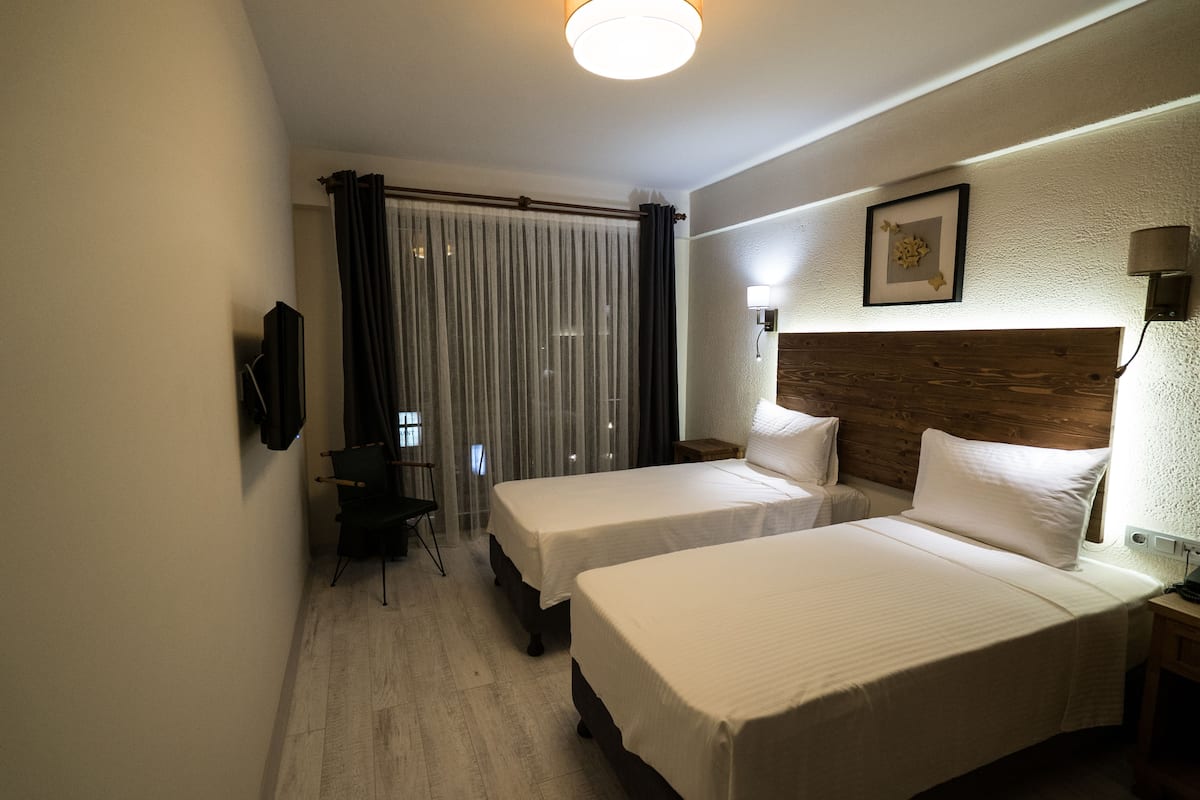 Hochwertige Bettwaren, Minibar, Schreibtisch