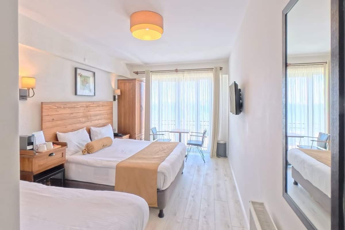 Chambre triple | Literie de qualité, minibar, bureau