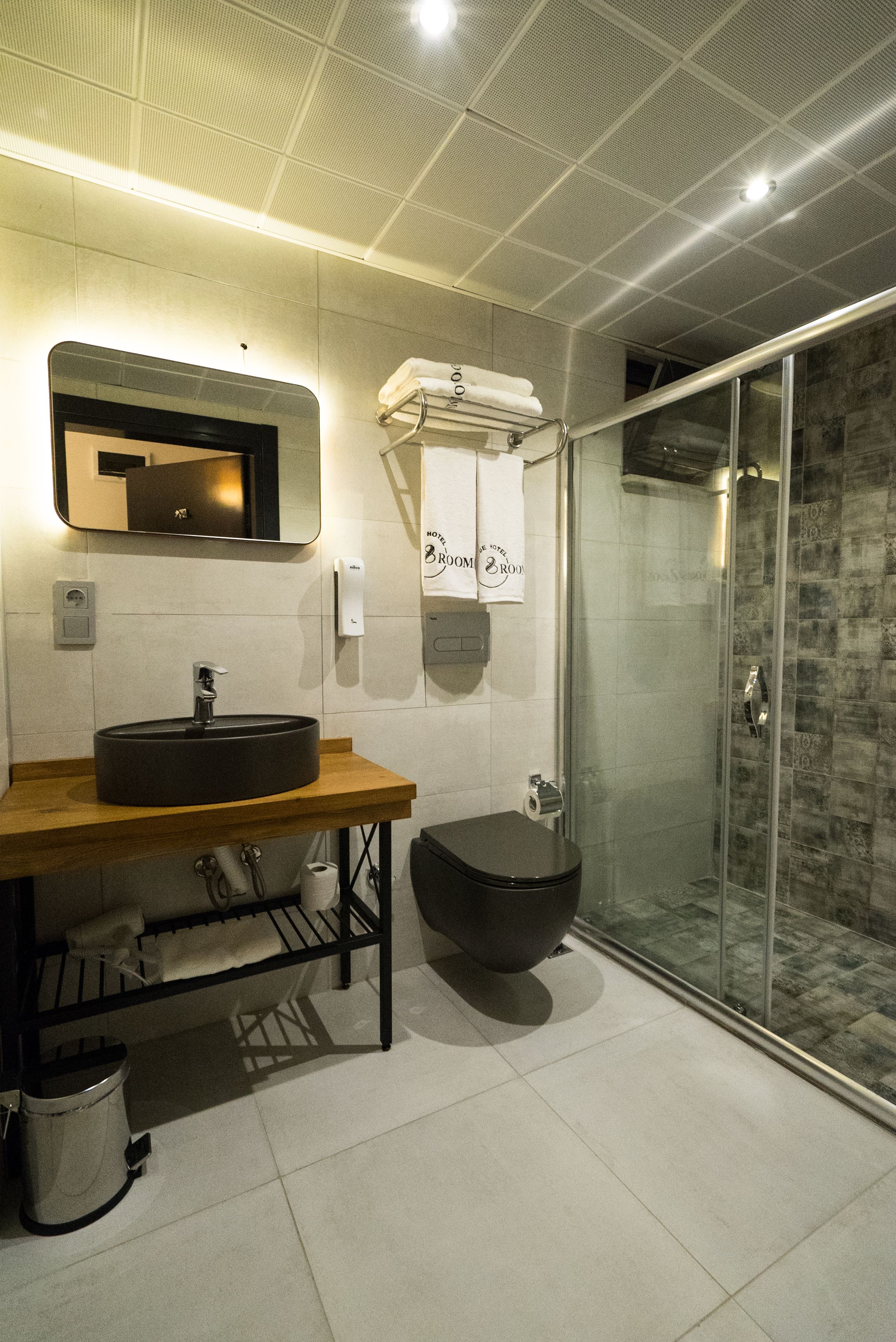 shower, eco-friendly toiletries, hair dryer, slippers