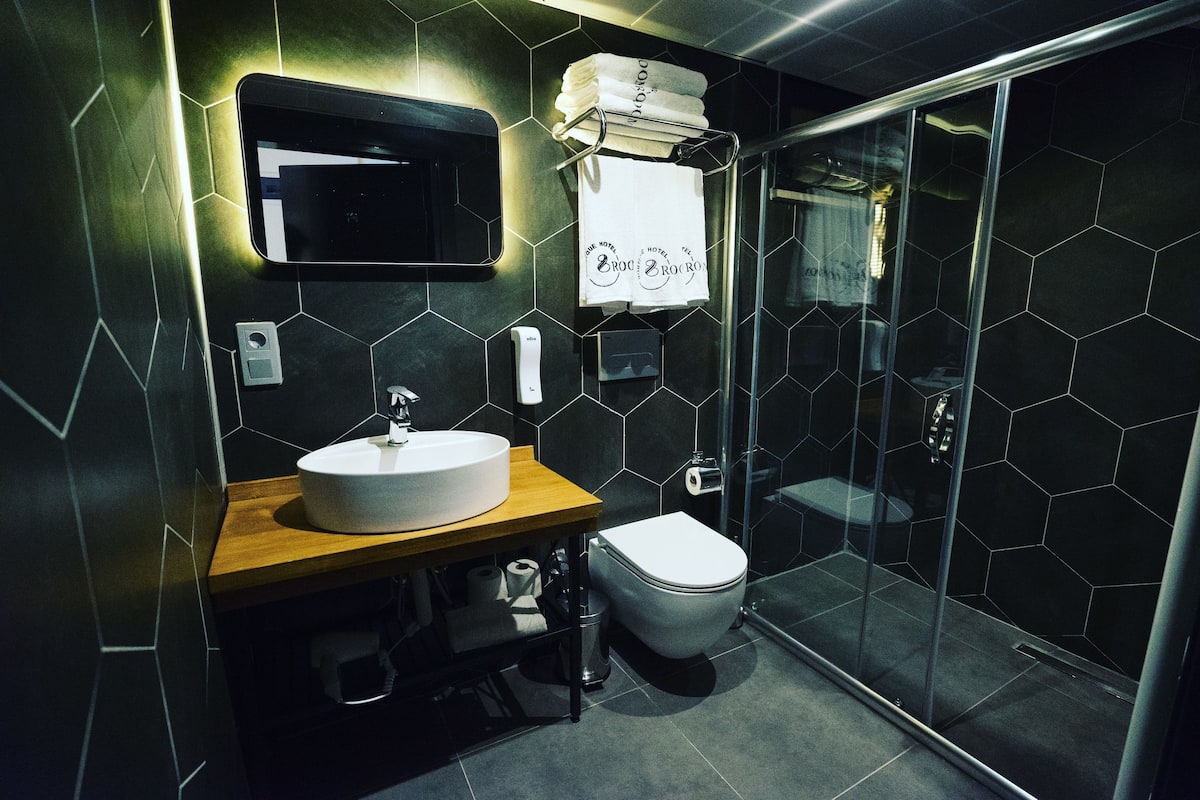 shower, eco-friendly toiletries, hair dryer, slippers