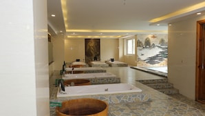 A spa area with multiple tubs and a large mural on the wall. - Central Phu Hung Hotel (Quang Phu)