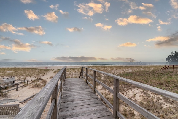 On the beach, sun loungers, beach towels