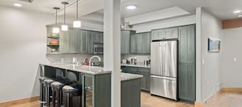 Centrally Located Luxury Home right on Rock Creek perfect for Large Groups