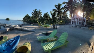 On the beach, sun loungers, beach towels