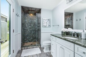 Combined shower/tub, hair dryer, towels, soap
