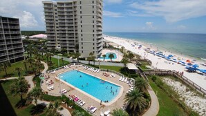 A hotel with a pool, beach, and ocean view. - EXTREME MAKEOVER- 200 5 STAR REVIEWS. DIRECT BEACH VIEWS-LUXURY AT GREAT PRICING (Orange Beach)