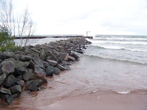 On the beach, sun-loungers