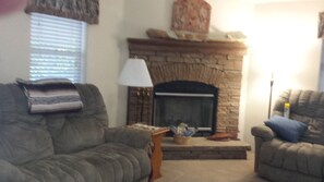 Smart TV, fireplace, Netflix, books