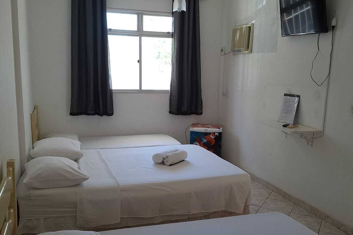 Quarto quádruplo família | 1 quarto, frigobar, cortinas blackout, Wi-Fi de cortesia