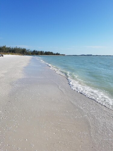 Quick drive to the beach, Large open concept home with seasonally heated pool