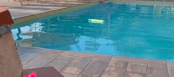 cottage with veranda and pool