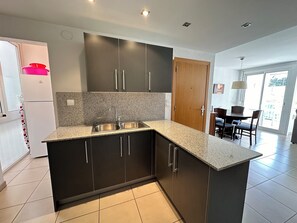 Fridge, microwave, oven, coffee/tea maker