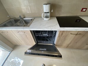 Fridge, microwave, dishwasher, coffee/tea maker