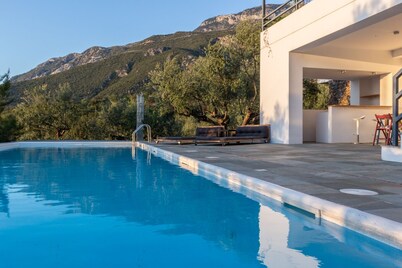 Luxury villa with private heated pool and stunning sea views.