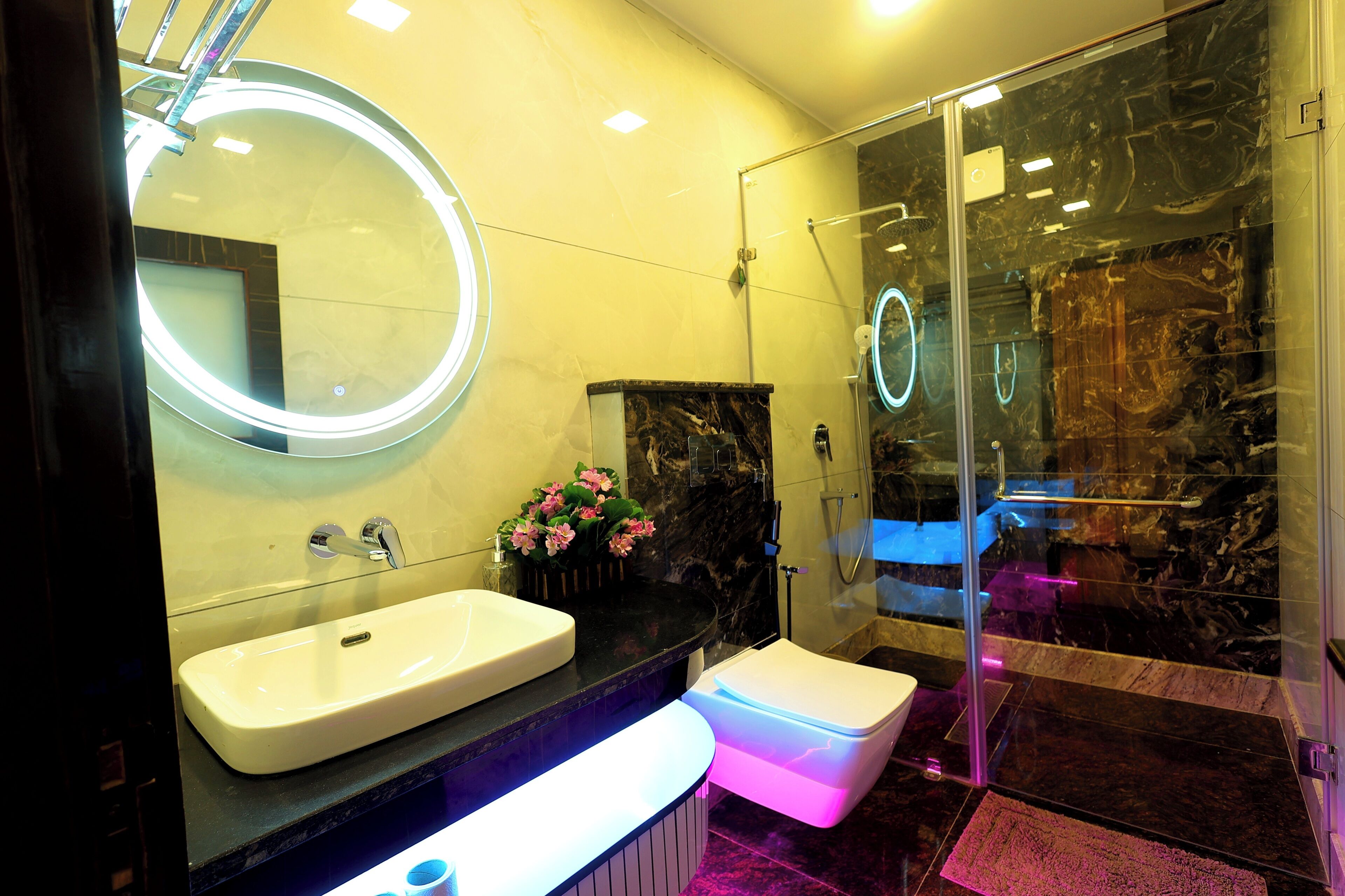 luxury quadruple room | bathroom | shower, free toiletries, hair dryer, slippers