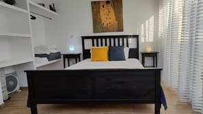 1 dormitorio, tabla de planchar con plancha, cuna de viaje y wifi gratis