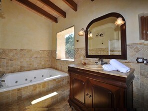 Bathtub, hair dryer, towels