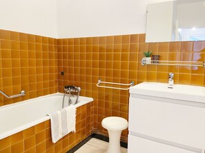 Bathtub, hair dryer