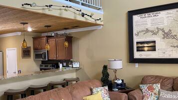 TV connectée, cheminée, lecteur de DVD, vidéothÚque