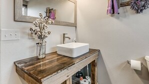Baignoire, séchoir à cheveux