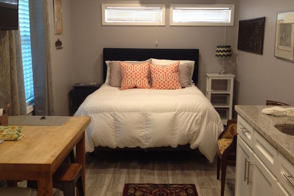 New Queen size bed + 2 night tables.