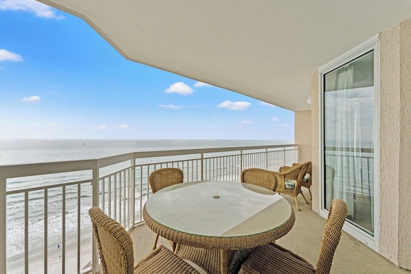 Outdoor dining - Elegant and Comfortable Oceanfront Condo, Lazy River | Crescent Shores - S 1707 (North Myrtle Beach)