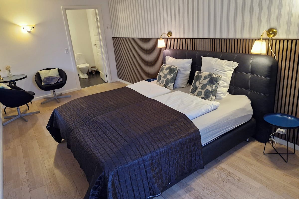 Deluxe tweepersoonskamer, uitzicht op tuin | 1 slaapkamer, luxe beddengoed, individueel gedecoreerd