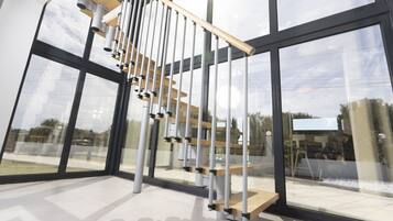 Deluxe Villa, 1 Bedroom | Living area | Flat-screen TV