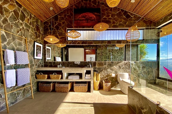 Another angle of the bath room with lamps and basket made by local artisans...