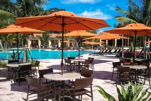 Outdoor pool, a heated pool - 🎉JANUARY - MARCH ‘27 Now Avaliable🎉 IMMACULATE LUXURY CONDO-TREVISO BAY, NAPLES (Naples)