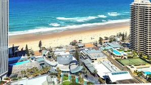 A coastal hotel with a beach view, a pool, and a tennis court. - TOP FLOOR H Residence 13204 - Level 32 2 bedrooms (Surfers Paradise)