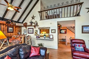 TV, fireplace, books