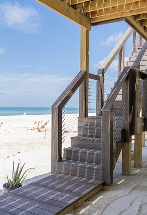 On the beach, sun-loungers, beach umbrellas, beach towels