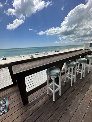 On the beach, sun loungers, beach umbrellas, beach towels