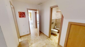 Bathtub, hair dryer, towels
