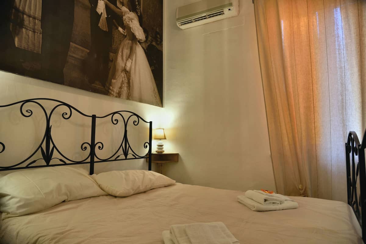 Classic Double Room, 1 Queen Bed | Iron/ironing board, cribs (surcharge), rollaway beds (surcharge)