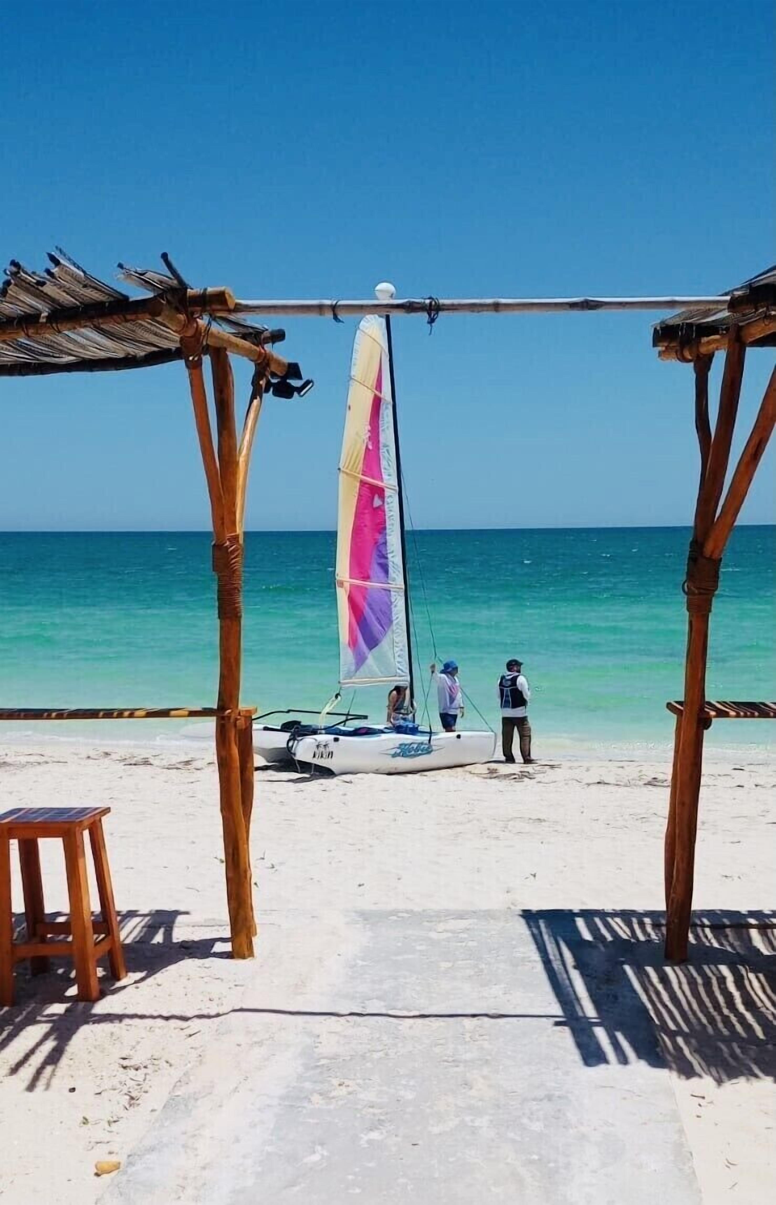On the beach, sun loungers, beach towels