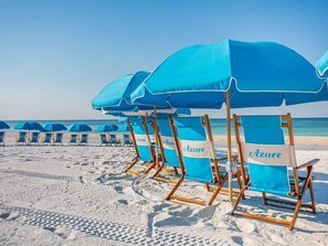 On the beach, sun-loungers