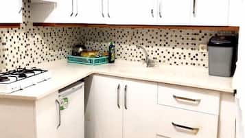 Fridge, stovetop, cookware/dishes/utensils
