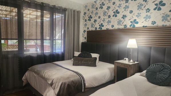 3 bedrooms, desk, iron/ironing board, travel cot