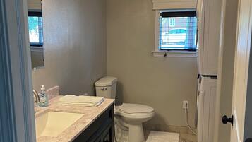 Hair dryer, towels, soap, toilet paper