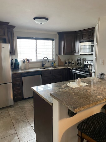 Fridge, microwave, oven, stovetop. Snake River Cabin in Grand View